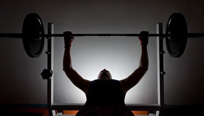 A man with a bar